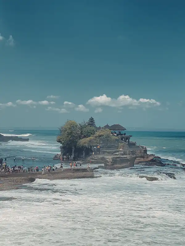 Tanah Lot Temple Bali - Iconic Sea Temple at Sunset, most photographed temple in Bali, oceanfront temple with dramatic sunset views, Bali spiritual landmark, must-visit Bali attraction, Tanah Lot sunset tour, Bali private day tour, cultural and scenic temple tour in Bali, things to do in Bali at sunset, Bali coastal temple experience