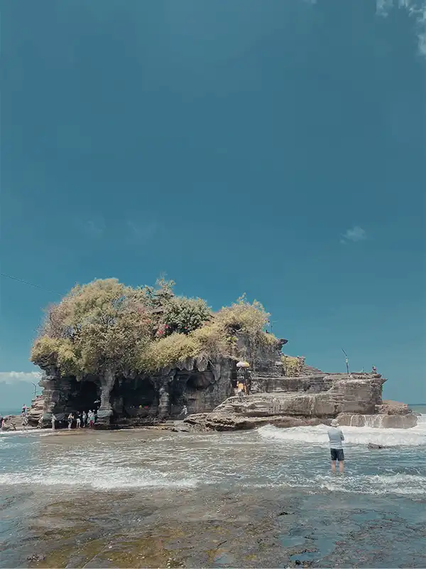 Tanah Lot Temple Bali - famous sea temple on a rock formation, iconic coastal temple in Tabanan, spiritual Hindu shrine by the ocean, top Bali tourist attraction, scenic Bali temple tour, Bali cultural heritage site, private Bali day trip to Tanah Lot, must-visit Bali temple, ocean view temple Bali, Bali spiritual and photo destination