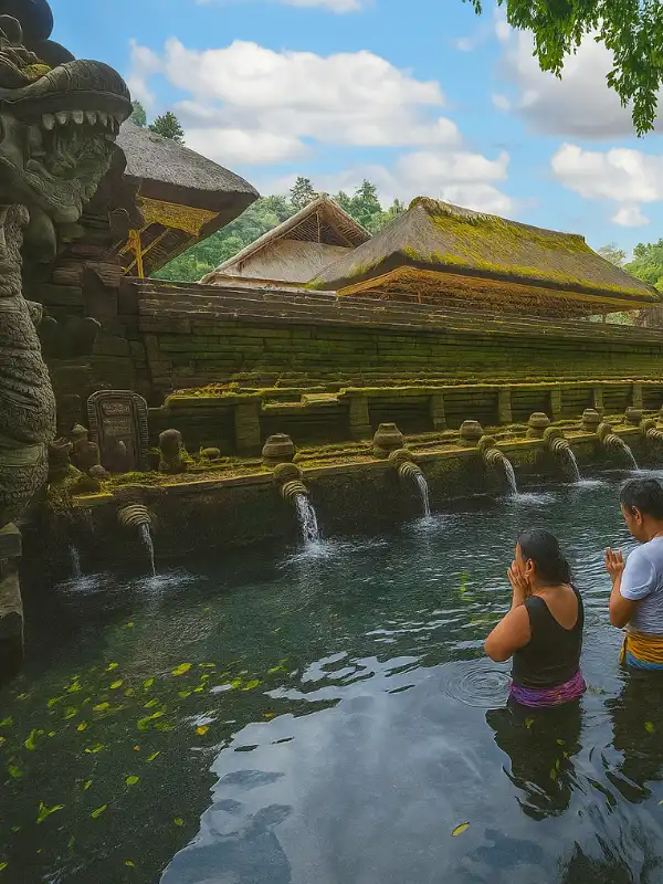Tirta Empul Temple is a sacred Hindu water temple in Bali, known for its holy spring where locals and visitors perform purification rituals. Located near Kintamani, this spiritual site is one of the top cultural destinations featured in our Kintamani Tour by BaliWondersTour. Discover Balinese traditions and spirituality during your Bali tour as you explore the history and sacred waters of Tirta Empul.