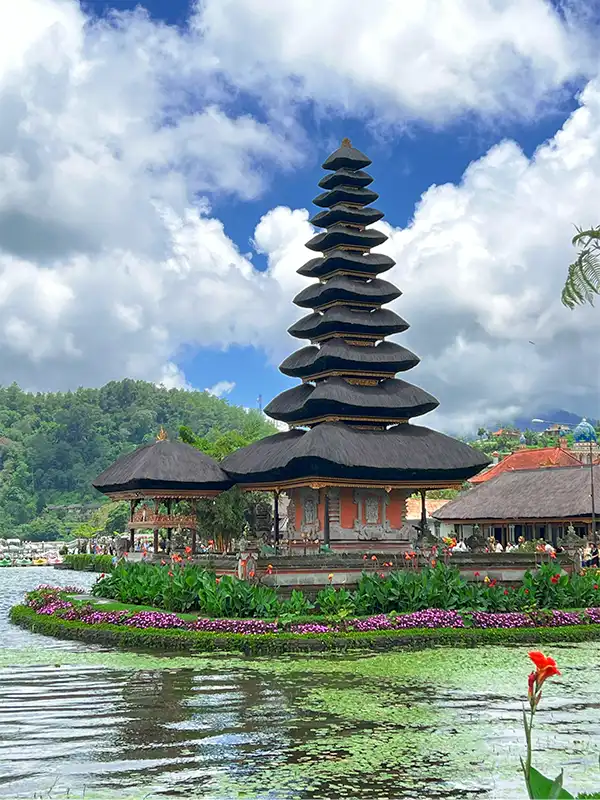 Ulun Danu Beratan Temple Bedugul Bali - iconic lake temple in the mountains, sacred Hindu water temple on Lake Beratan, must-visit cultural landmark in North Bali, spiritual and scenic Bali tour, traditional Balinese architecture, serene nature and cultural experience, top temple tour in Bali