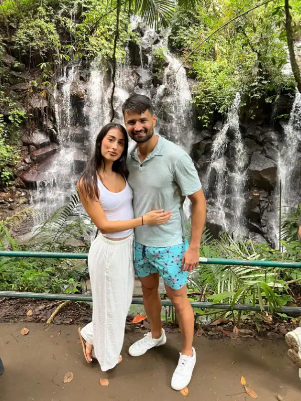 Kanto Lampo Waterfall Gianyar Bali - multi-layered waterfall with refreshing natural pool, scenic jungle backdrop near Ubud, popular nature attraction for swimming and photos, hidden paradise in Bali countryside, relaxing Bali day trip destination for travelers