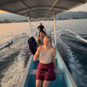Sunrise dolphin tour in Lovina Bali - early morning boat trip to see wild dolphins 